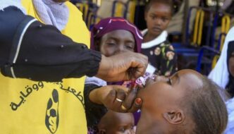 A nurse administers the cholera vaccine to a child in Sudans Gedaref city on November 20 2023. AFP