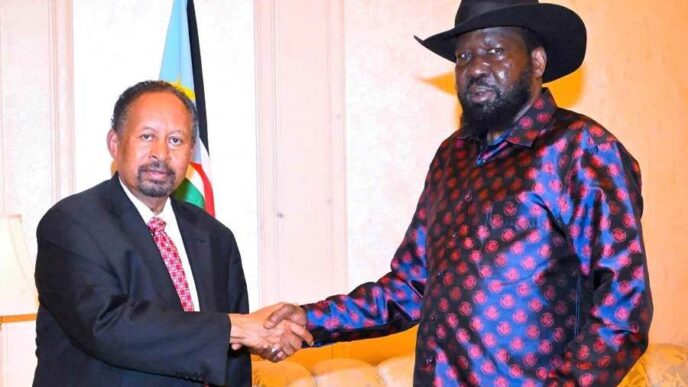 President Salva Kiir shakes hands with former Prime minister Abdallah Hamdok on December 8 2023 1