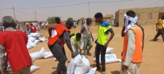 Food is distributed by the Sudanese Red Crescent in Omdurman close to the Sudanese capital Khartoum on May 30 2023
