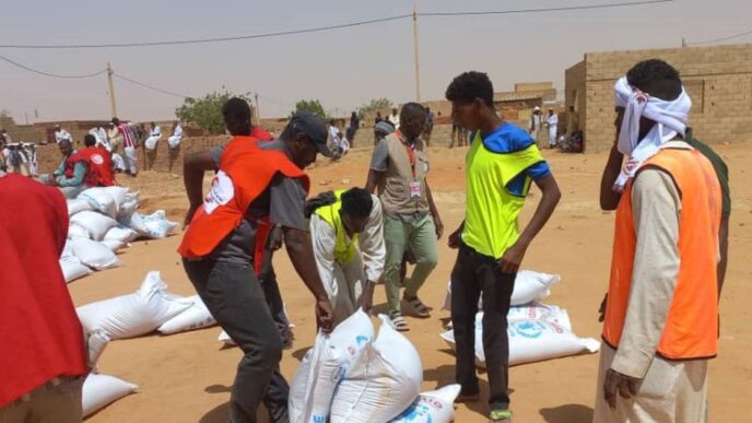 Food is distributed by the Sudanese Red Crescent in Omdurman close to the Sudanese capital Khartoum on May 30 2023