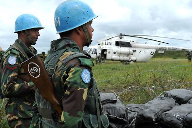 jpg un peacekeepers in south sudan with one of their helicopters unmiss 2